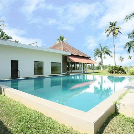 Oyo 26874 Manor Backwater Resort คุมาราคม ภายนอก รูปภาพ