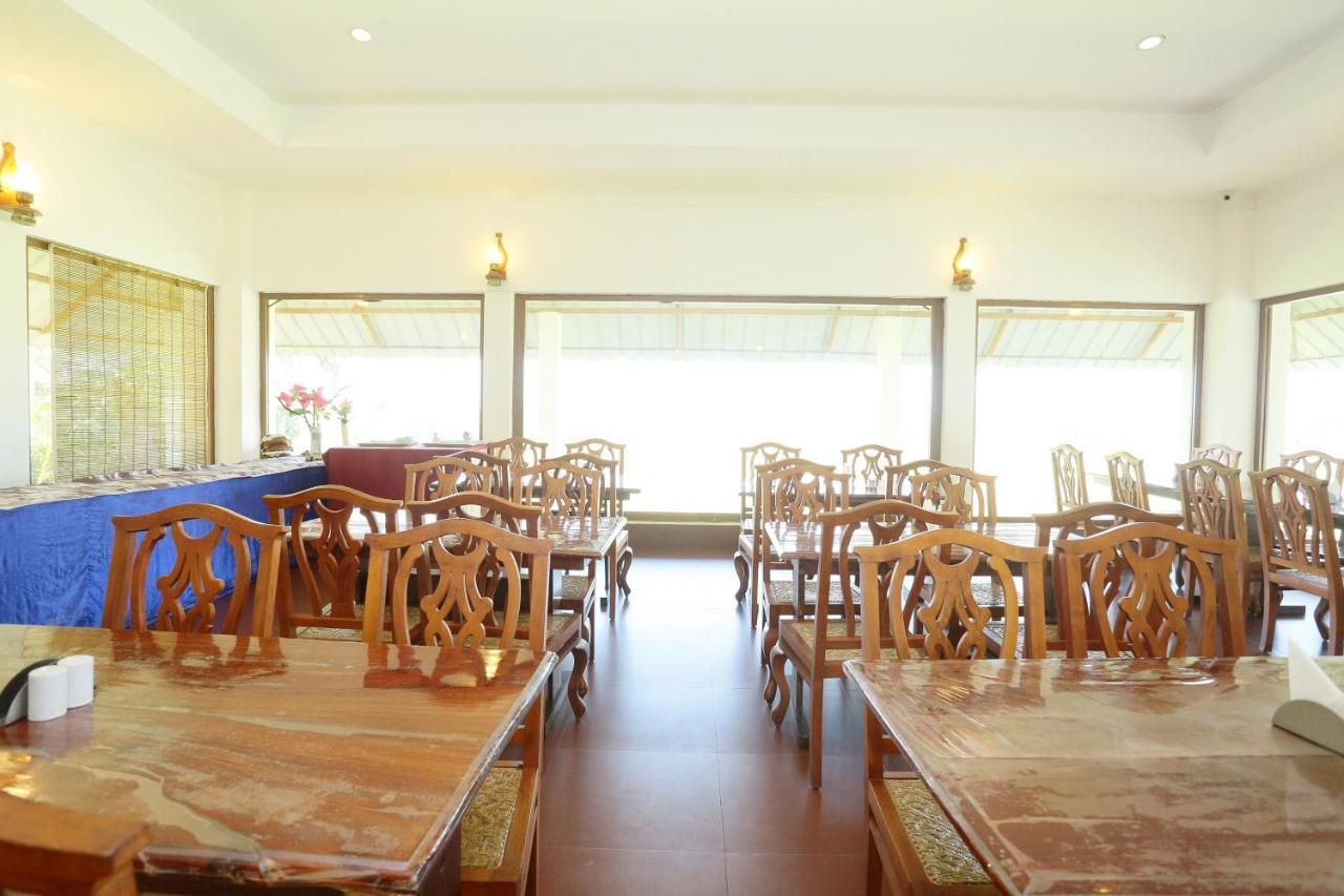 Oyo 26874 Manor Backwater Resort คุมาราคม ภายนอก รูปภาพ