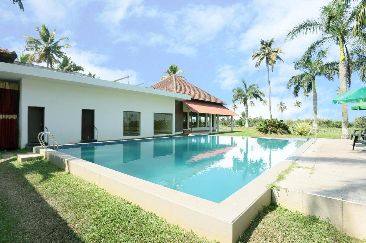 Oyo 26874 Manor Backwater Resort คุมาราคม ภายนอก รูปภาพ