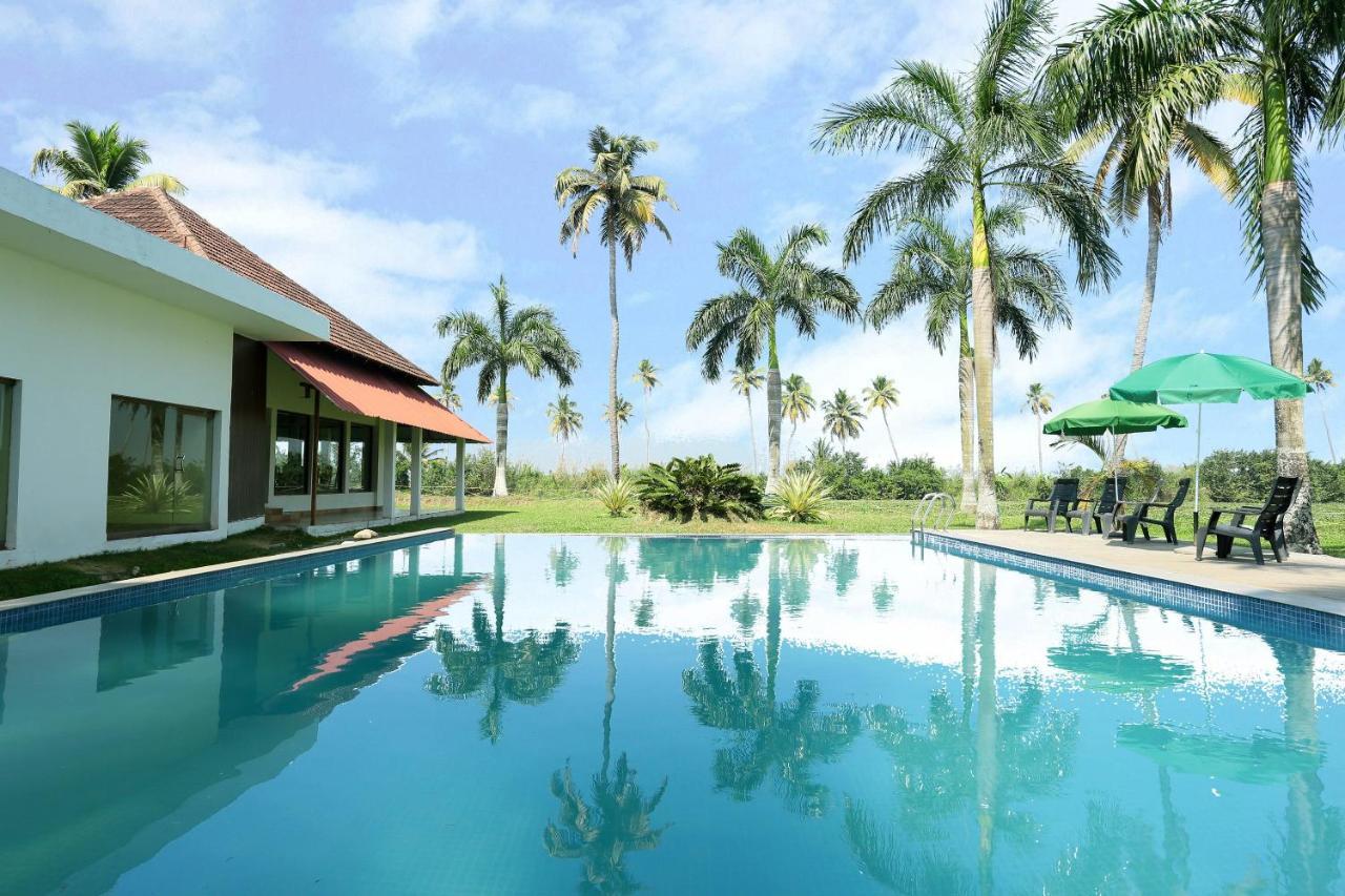 Oyo 26874 Manor Backwater Resort คุมาราคม ภายนอก รูปภาพ