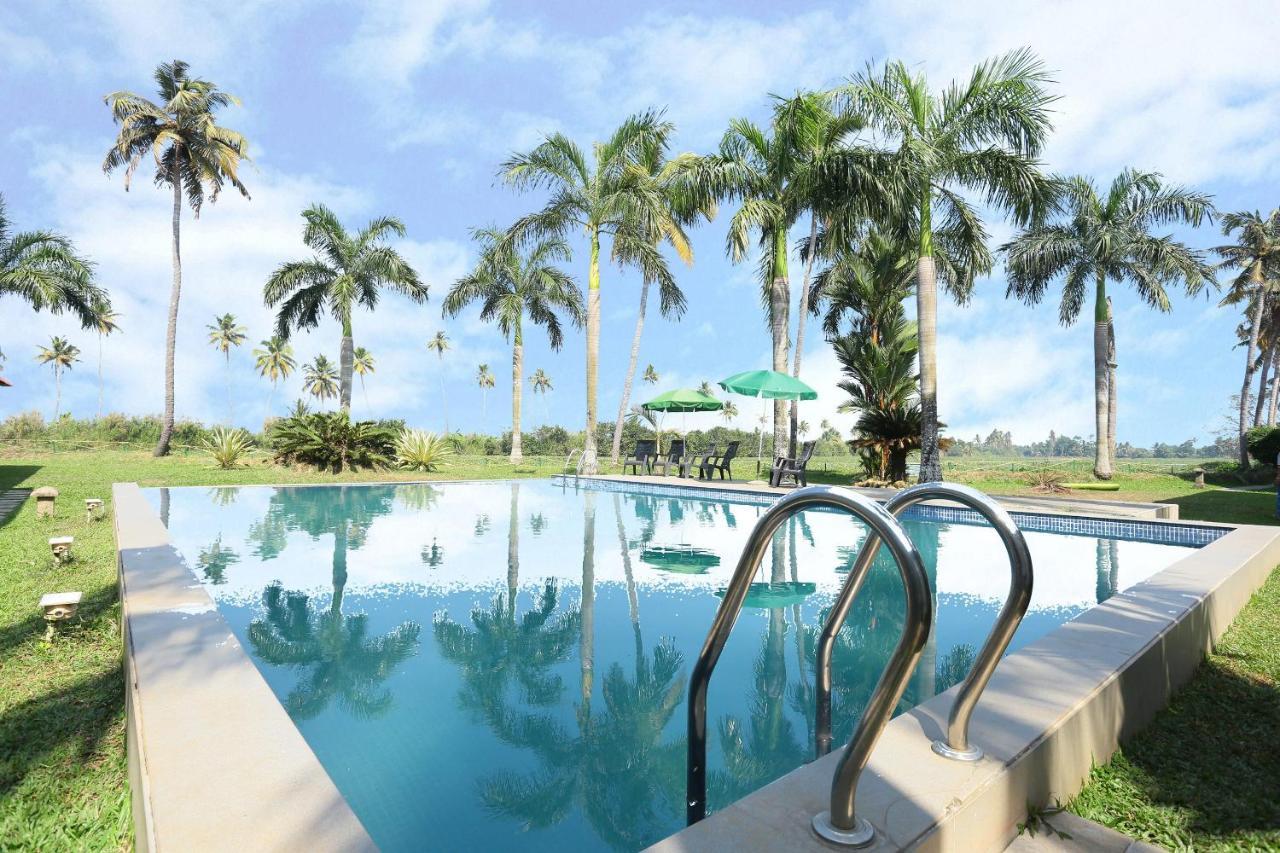 Oyo 26874 Manor Backwater Resort คุมาราคม ภายนอก รูปภาพ